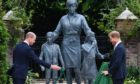 The Duke of Cambridge (left) and Duke of Sussex unveiling a statue they commissioned of their mother Diana, Princess of Wales, in the Sunken Garden at Kensington Palace, London, on what would have been her 60th birthday.