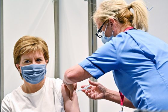 Nicola Sturgeon receiving a coronavirus vaccine