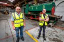 Mike Heron and Keith Brown with the Lochmore Meadows train they want to restore.