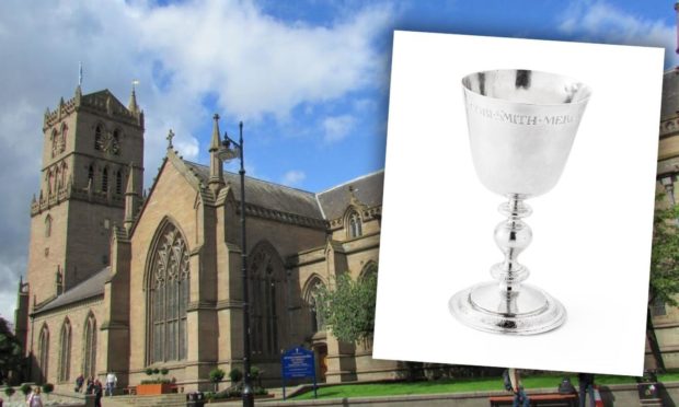 The Steeple Church and the cup up for auction next month.