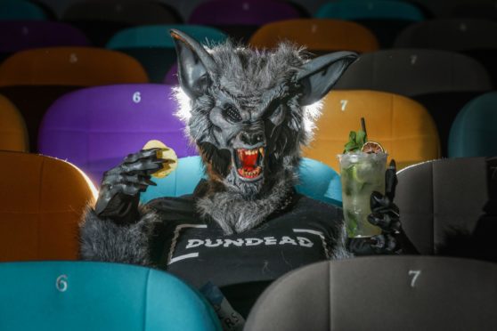 A werewolf chills out with a mojito and snacks in the DCA cinema. Picture: Mhairi Edwards.