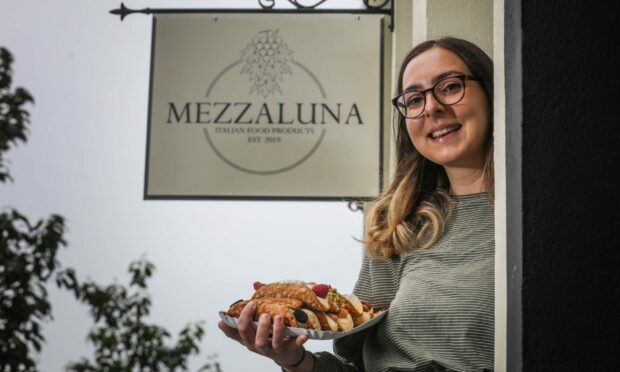 Chiara Di Ponio-Horne with some of Mezzaluna's famous cannoli.