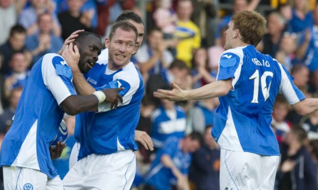 Liam Craig celebrates with Gregory Tade after his goal against Eskisehirspor in 2012.