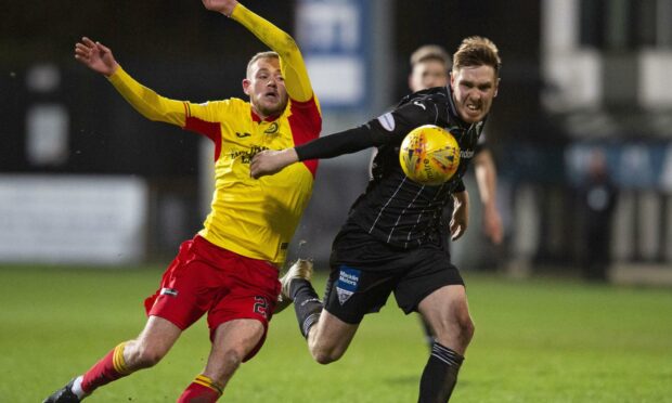 Martin in action against Partick Thistle