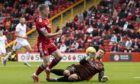 Jonny Hayes helped Aberdeen see off the challenge of Dundee United on the opening day of the season