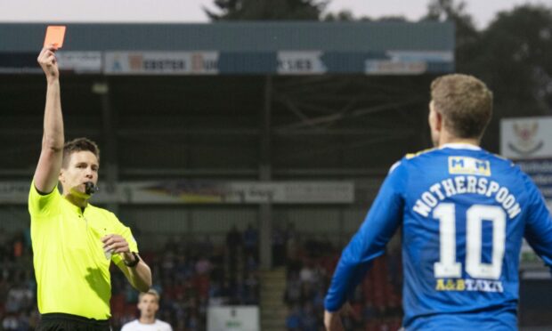 Daniel Siebert sends off St Johnstone's David Wotherspoon.