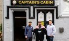 From left: Simon Cruikshank, Chris Symonds and Sean Bennet outside Captain's Cabin.