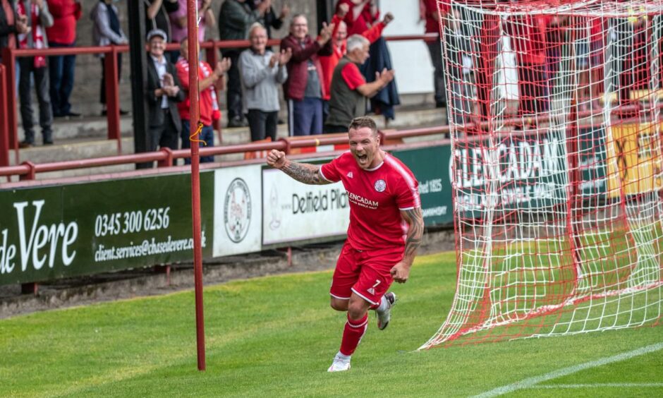 David Cox celebrates one of his goals for Brechin.