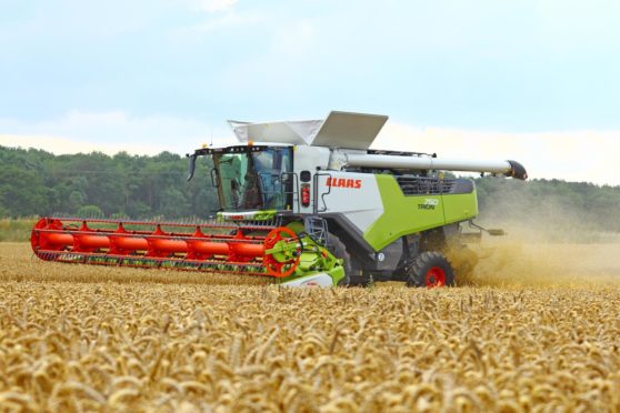 The Claas TRION 750 combine harvester in action.