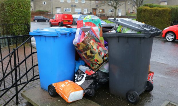 Extra rubbish left beside bins will no longer be collected.
