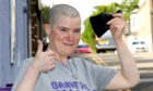 Sarah Anderson braved the shave to raise money for Macmillan Cancer Support. Pic: Gareth Jennings/DCT Media.