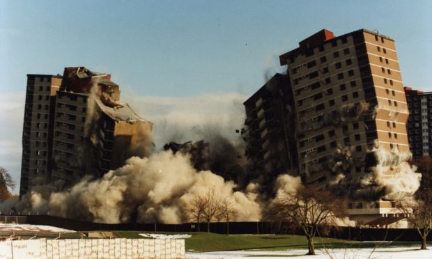 Going out with a bang: Ardler multis are demolished in 1996.