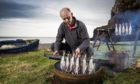 Iain Spink keeps the tradition of making Arbroath Smokies in a barrel alive at events up and down the country.