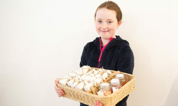 11-year-old Amelia Milton is selling her Smelleez soaps in the Dundee Science Centre.