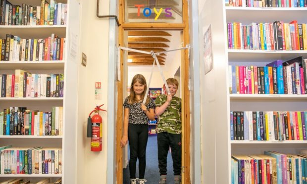 Ellie Simpson and Cameron Holmes opened the new toy area at The Learning Tree in Arbroath. Pic: Kim Cessford/DCT Media.