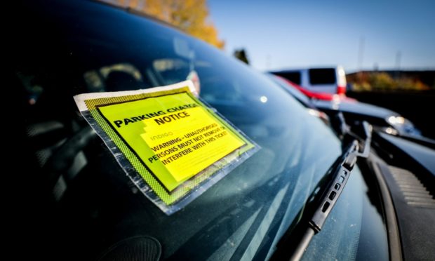 A car with a penalty charge notice at Ninewells Hospital