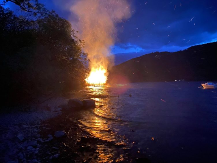 Flames from fire at Scottish Crannog centre in 2021.