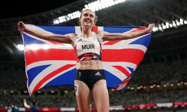 Laura Muir celebrates winning silver in Tokyo.