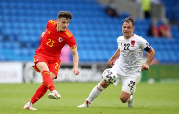 Dylan Levitt in action for Wales at the Cardiff City Stadium