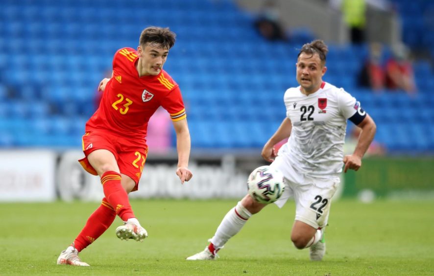 Dylan Levitt in action for Wales at the Cardiff City Stadium