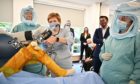 Nicola Sturgeon and Health Secretary Humza Yousaf were shown new medical equipment as they launched a 'recovery plan'
