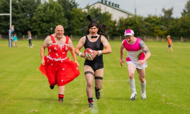 Brechin Rugby Club members (from left) Mark Henry, Matthew Chisholm and Ross Milne dressed to impress. Pic: Steve MacDougall/DCT Media.
