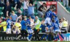 The St Johnstone players and fans celebrating a goal in a match vs Hibs back in August 2019.