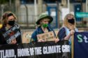 Protesters in covid masks at a climate change demonstration at Mossmorran at the weekend.
