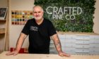 Don Tait of Crafted Pine Co inside the premises at Overgate Shopping Centre.