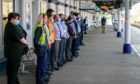 Staff and passengers at Dundee railway station paused for a minute's silence.