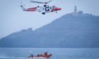 Kinghorn lifeboat crew and coastguard helicopter