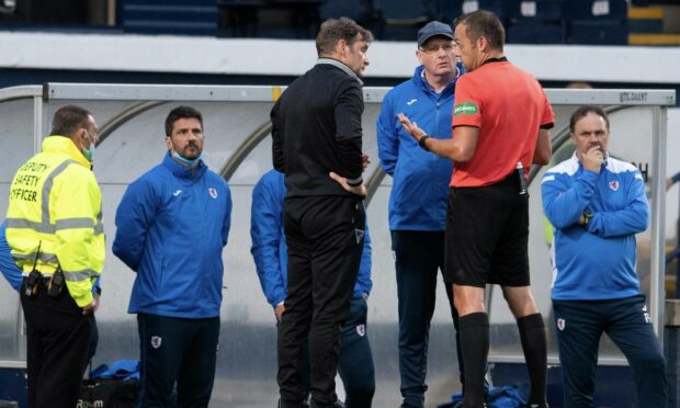 McGlynn and Grant speak to referee Gavin Duncan