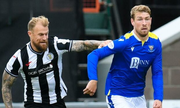 St Mirren's Richard Tait and St Johnstone's David Wotherspoon in action.
