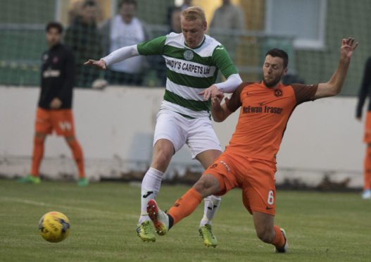 Lewis Toshney's (right) time at Dundee United could soon be over.