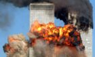 Hijacked United Airlines Flight 175 from Boston crashes into the south tower of the World Trade Center and explodes at 9:03 a.m. on September 11, 2001