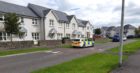 A police car on Strathyre Avenue.