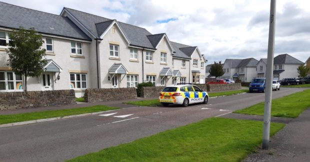 A police car on Strathyre Avenue.