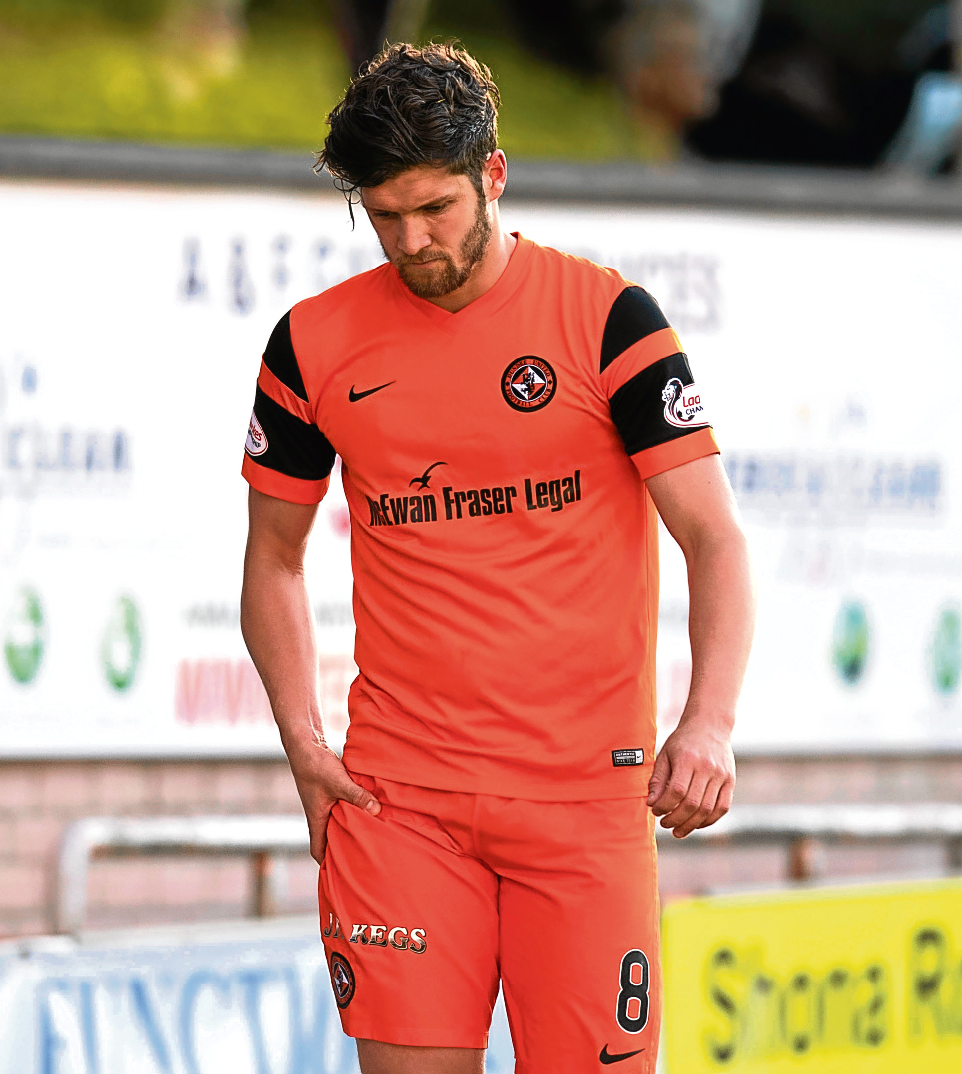 Stewart Murdoch leaves the field with an injury.