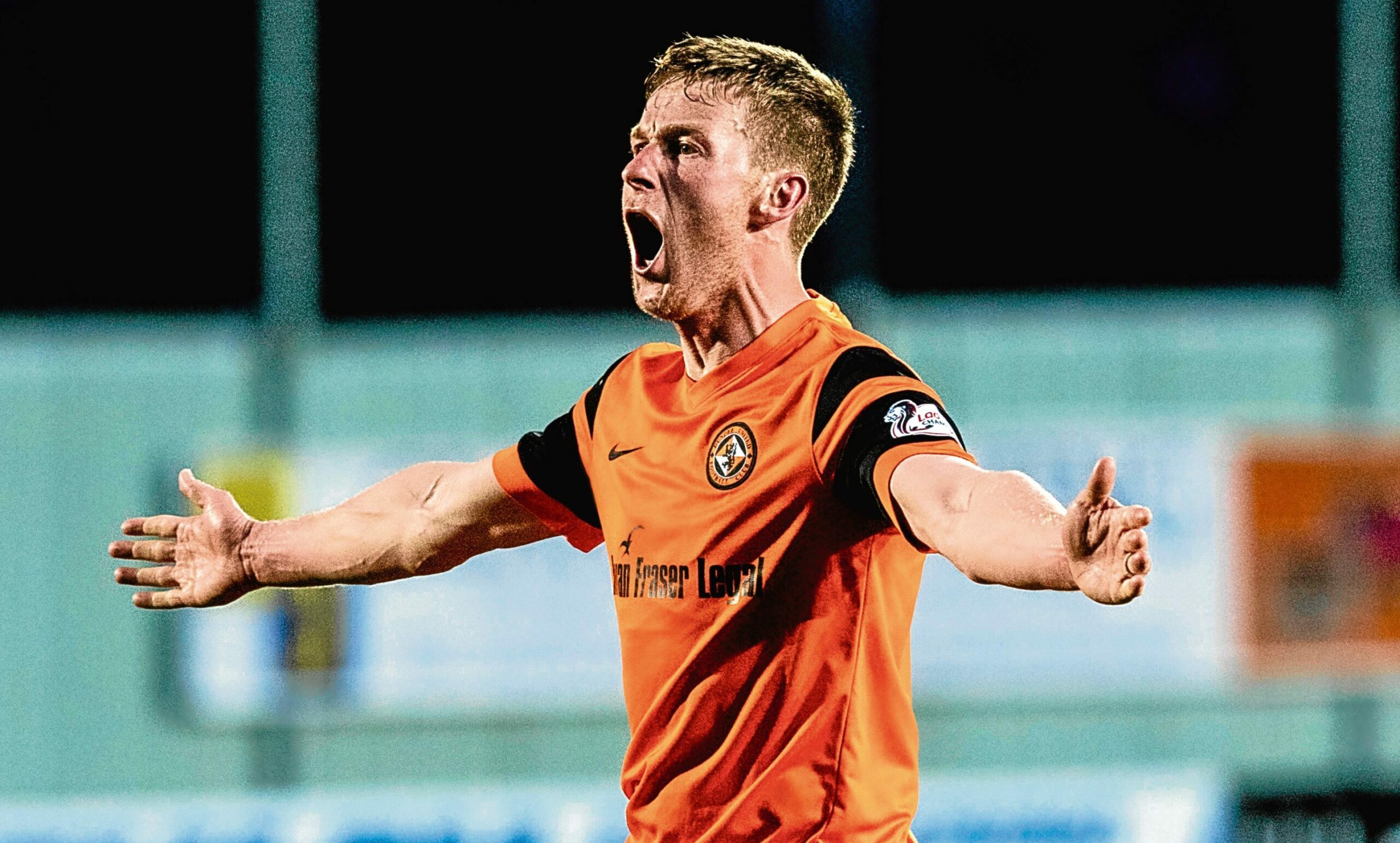 Paul Dixon celebrates grabbing the late winner for Dundee United in the play-off semi-final.