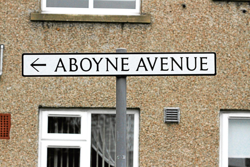 A street sign that reads 'Aboyne Avenue'. 