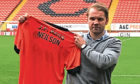 New Dundee United manager Robbie Neilson reckons he has become a better manager for his time in England with MK Dons.
