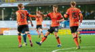 Matty Smith (right) congratulates Fraser Fyvie on his penalty-kick equaliser in the 1-1 draw against Partick Thistle on Saturday