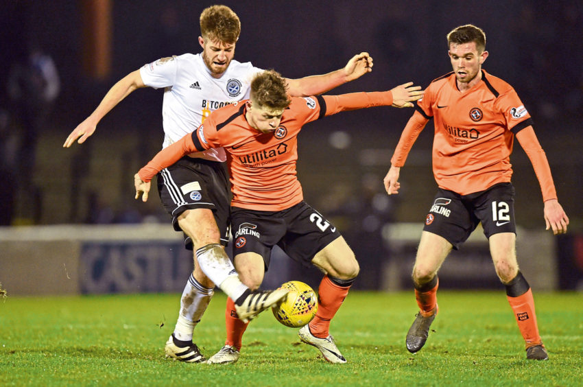 Ross Docherty playing against Dundee United in his Ayr United days