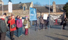 Members of the Scottish Unemployed Workers' Network outside Holyrood