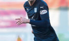 Dundee's Ethan Robson in action