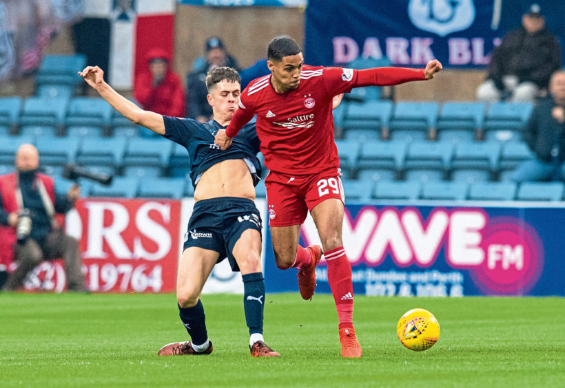 Callum Moore in action for Dundee in 2019.
