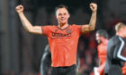 Lawrence Shankland celebrates a goal for Dundee United