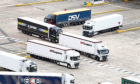Lorries wait to cross the Channel at the Port of Dover in Kent, as opposition parties have stepped up their demands for the immediate recall of Parliament after the Government released details of its Operation Yellowhammer no-deal preparations on Wednesday.