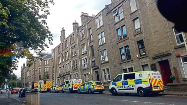 A 41-year-old man was found in a flat on Pitkerro Road