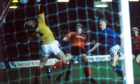 Mixu puts the ball past Rangers keeper Chris Woods at Ibrox in 1989.